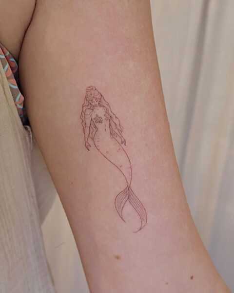 Fine-line mermaid tattoos for modern ocean lovers - Holistic Ink | sunraeartistrys