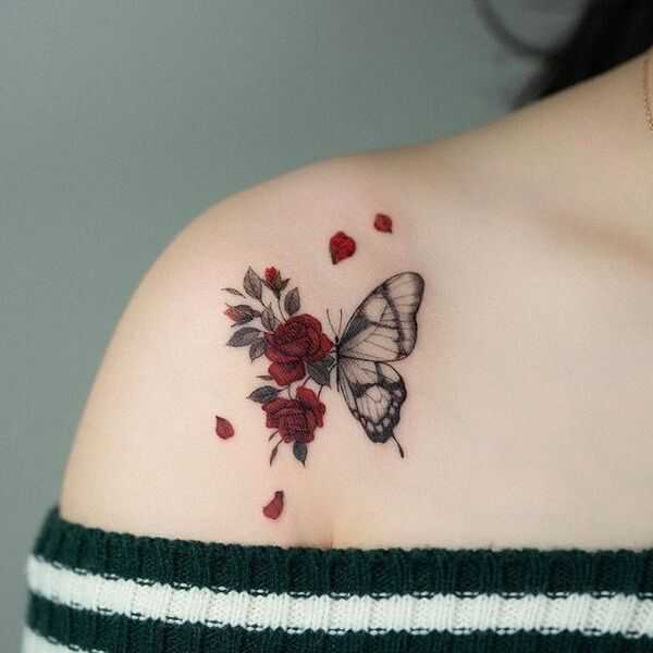Shoulder ink with vibrant roses and falling petals