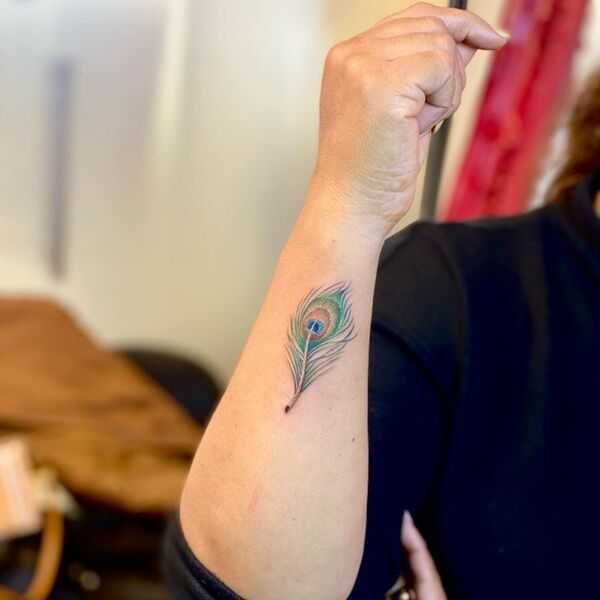 Peacock Feather on Wrist