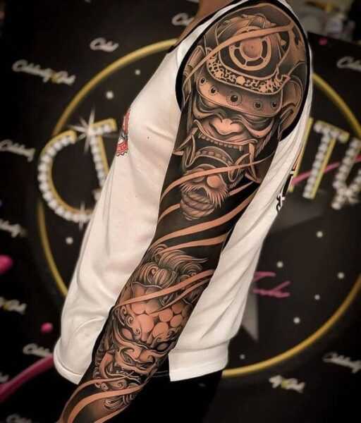 A black sleeve tattoo with strong symbolic meaning | Nicolas D