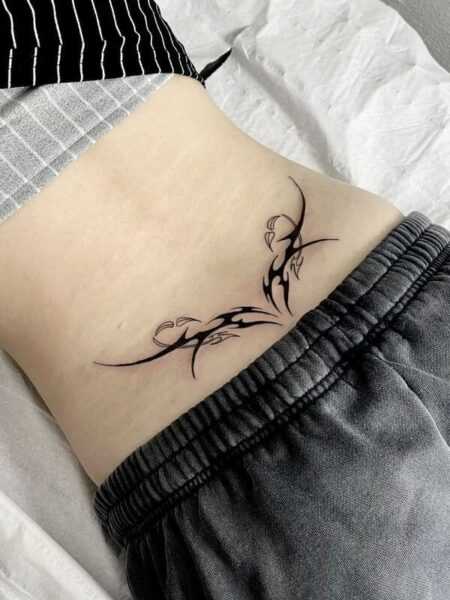 Tramp stamp is a slang term for a lower back tattoo