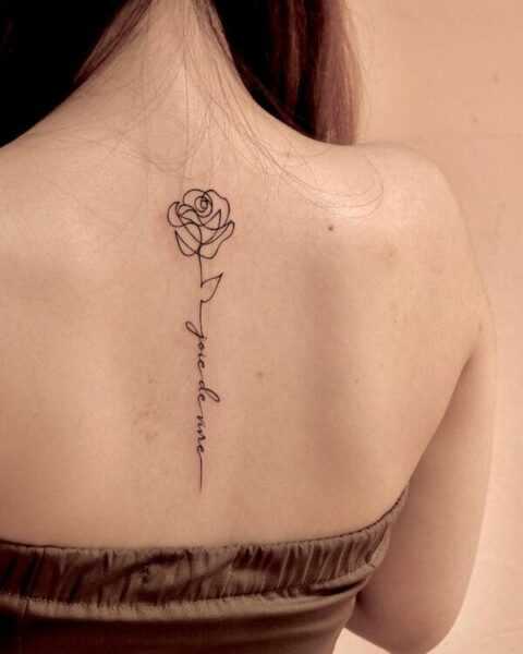 Single Stem Rose Fine Line Spine Tattoo | Studio Ink Concept